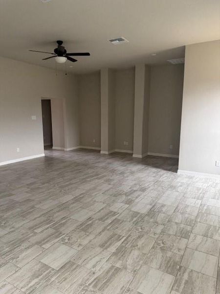 Unfurnished room featuring light hardwood / wood-style flooring and ceiling fan