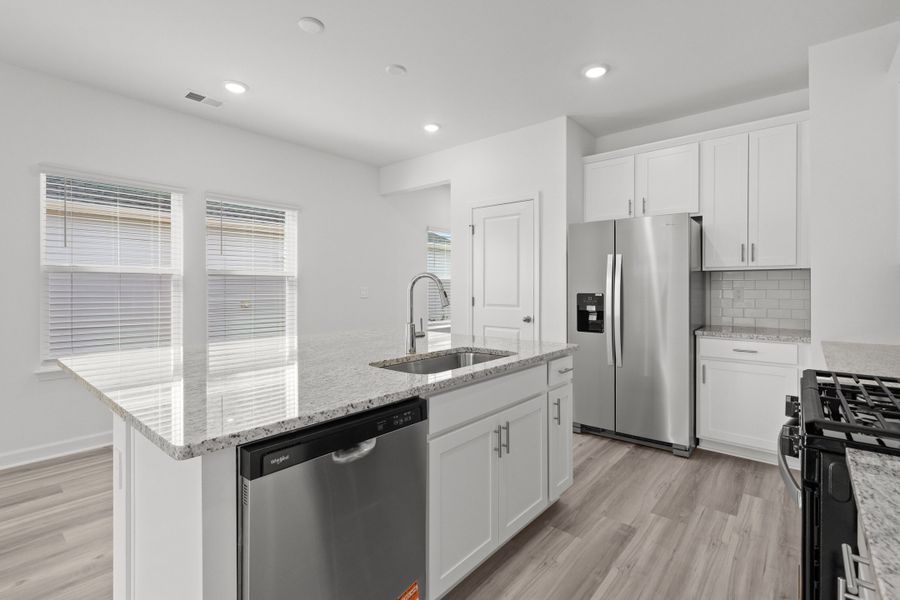 Furnished interior view inside a new home in Cypress Ridge - The Boardwalk Series, Longs (Image 6).