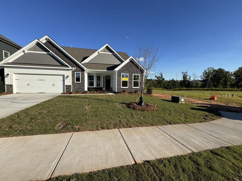 Front exterior of a new home in The Enclave at Laurelbrook, Sherrills Ford, NC, highlighting curb appeal (Image 2). Front exterior of a new home in The Enclave at Laurelbrook, Sherrills Ford, NC, highlighting curb appeal (Image 2).
