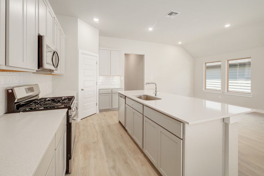 Furnished interior view inside a new home in Prairie Winds, Hutto (Image 8).