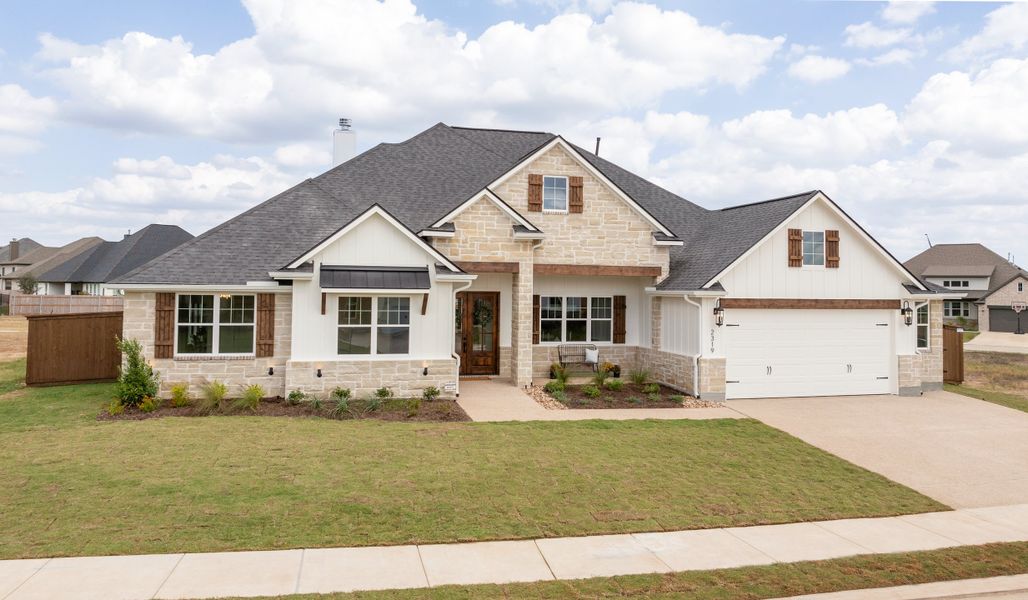 Representative exterior photo of a completed home built from the The Grayson by Reece Homes in Harvest Meadows, Bryan, TX (Image 23). Representative exterior photo of a completed home built from the The Grayson by Reece Homes in Harvest Meadows, Bryan, TX (Image 23).