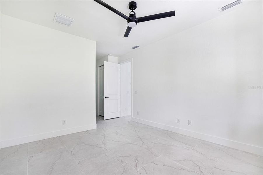 Spacious, unfurnished interior of a new home in , Port Charlotte (Image 25).