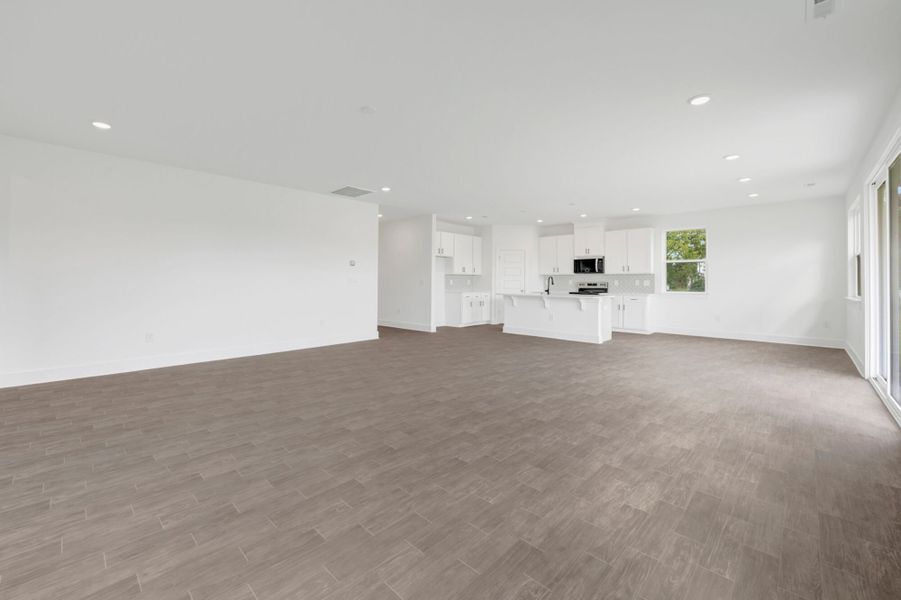 Spacious, unfurnished interior of a new home in McAlister Creek, Clayton (Image 16).