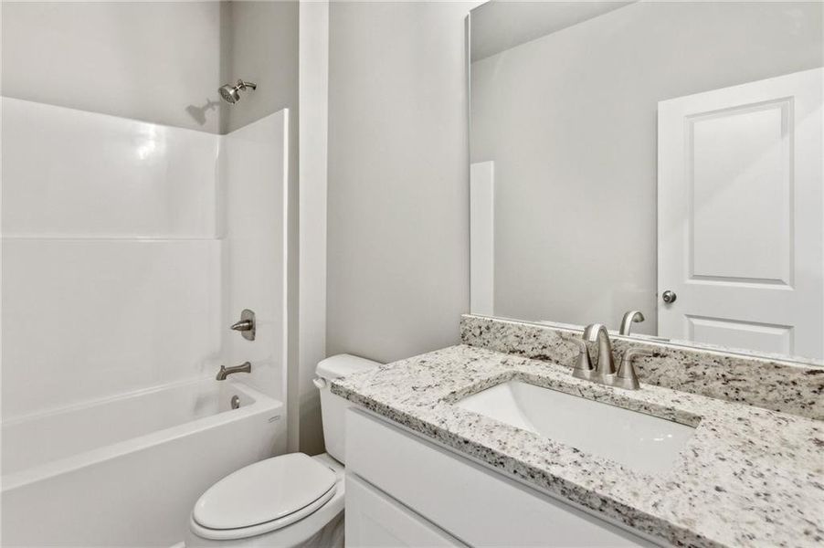 Furnished interior view inside a new home in Traditions of Braselton, Jefferson (Image 6).