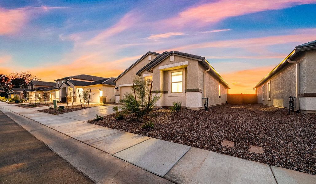 Front exterior of a new home in Saguaro Bloom, Marana, AZ, highlighting curb appeal (Image 18).