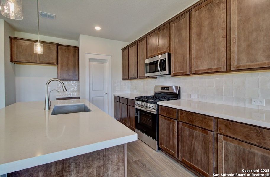 Furnished interior view inside a new home in Westridge - Landmark, San Antonio (Image 2). Furnished interior view inside a new home in Westridge - Landmark, San Antonio (Image 2).
