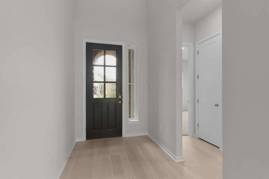 Representative unfurnished interior of a home built from the Madison by Chesmar Homes in University Heights, McKinney (Image 24).