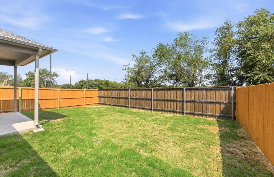 Exterior details and patio area of a home in Crosswinds, Kyle (Image 19). Exterior details and patio area of a home in Crosswinds, Kyle (Image 19).