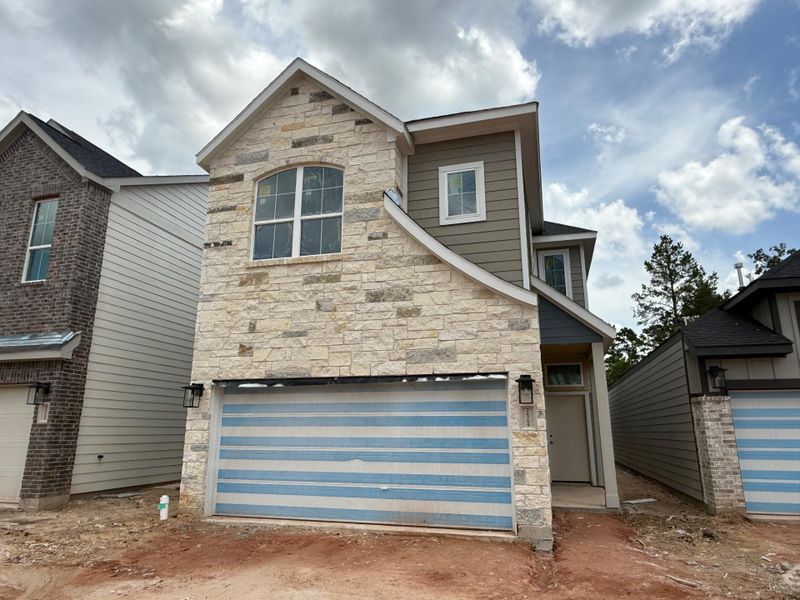 Front exterior of a new home in Kresston, Montgomery, TX, highlighting curb appeal (Image 10). Front exterior of a new home in Kresston, Montgomery, TX, highlighting curb appeal (Image 10).