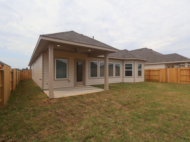 Exterior details and patio area of a home in Lone Star Landing, Montgomery (Image 29).