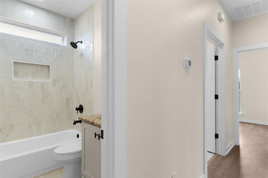 Secondary Hallway View to Secondary Bathroom