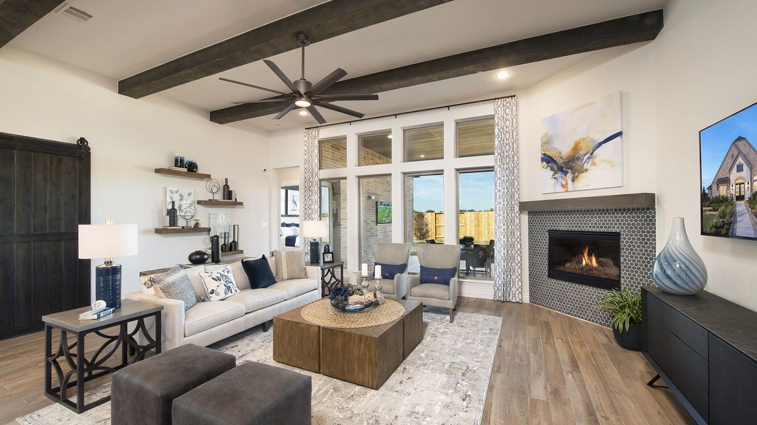 Representative furnished interior of a home built from the 3578W by Perry Homes in Lakes of Cane Island, Katy (Image 30).