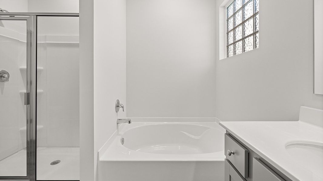 Representative furnished interior of a home built from the CALI by D.R. Horton in Lost Creek, Dallas (Image 12).