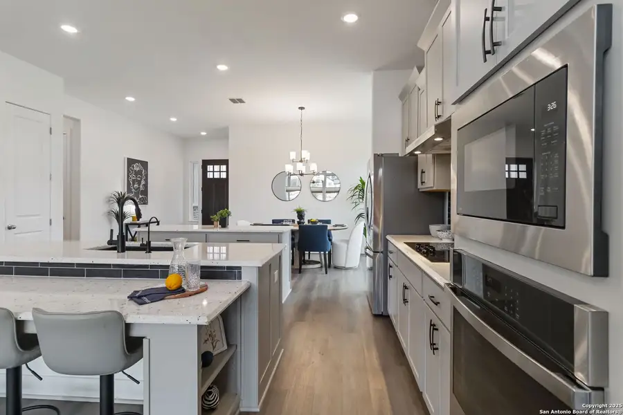 Furnished interior view inside a new home in Woodbridge Farms, La Vernia (Image 8).