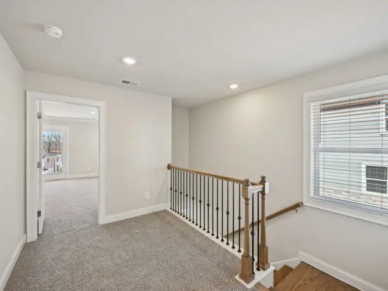 Spacious, unfurnished interior of a new home in Martin Springs - Cottage Series, Lawrenceville (Image 13).