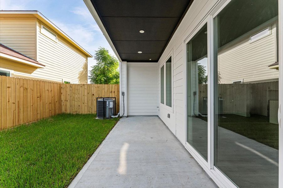 Exterior details and patio area of a home in , Houston (Image 26). Exterior details and patio area of a home in , Houston (Image 26).