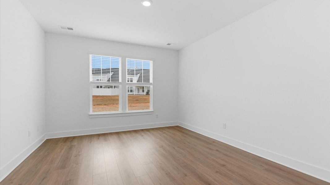 Furnished interior view inside a new home in Village at Midway, Anderson (Image 15).