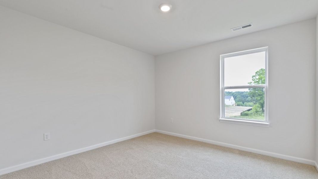 Spacious, unfurnished interior of a new home in Villa Grande, Winterville (Image 29).