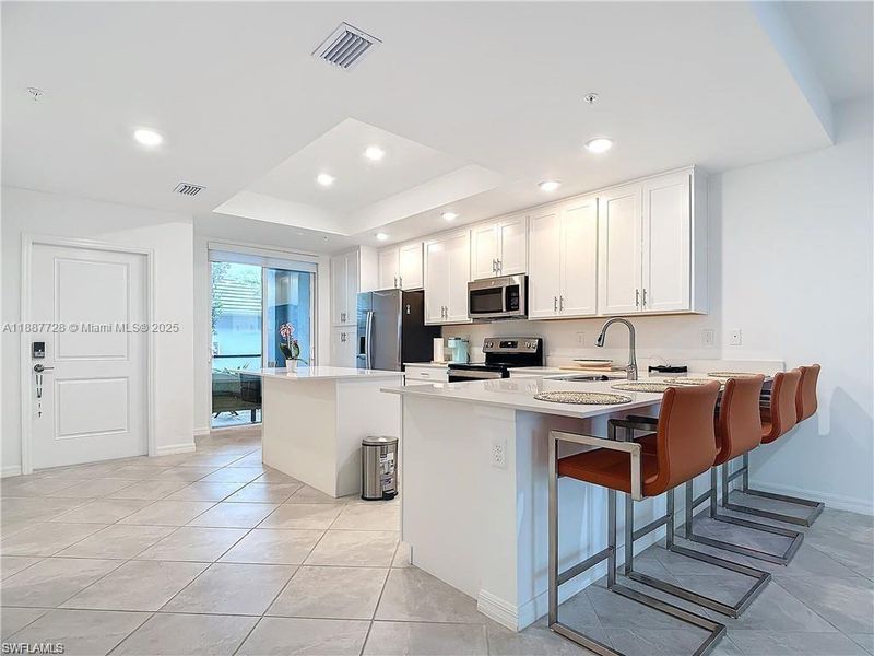 Furnished interior view inside a new home in , Ave Maria (Image 14).
