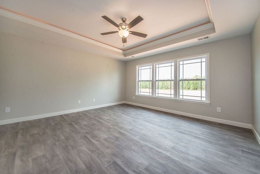 Representative unfurnished interior of a home built from the Beaumont by Enchanted Homes in Guadalupe Heights, Seguin (Image 53).