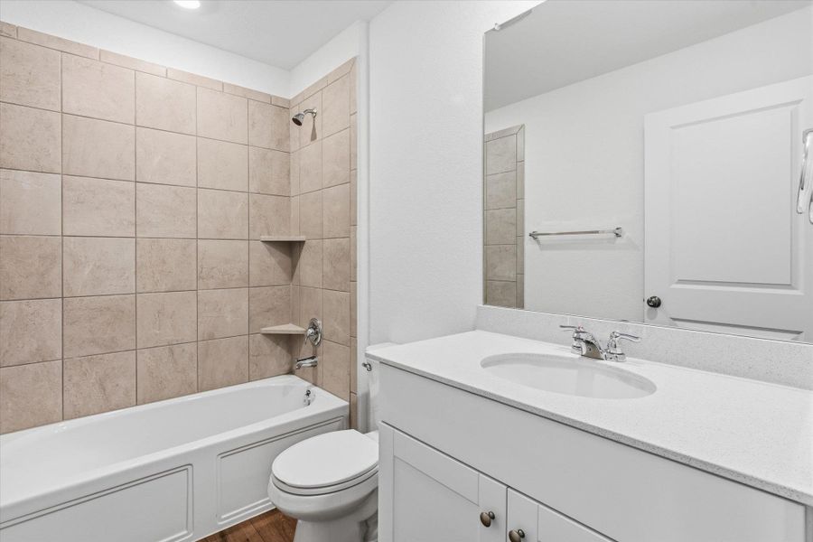 Furnished interior view inside a new home in Thunder Rock: Watermill Collection, Marble Falls (Image 9).
