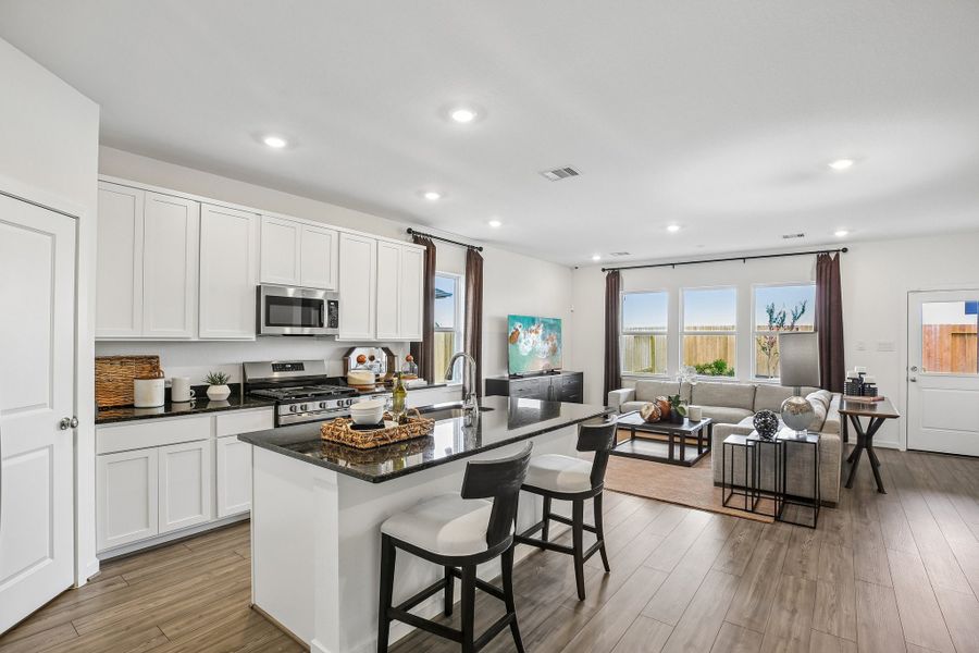 Representative furnished interior of a home built from the Charlton by Taylor Morrison in Mason Woods, Cypress (Image 11).
