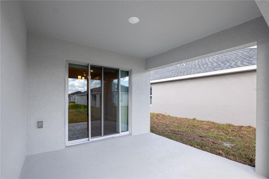 Exterior details and patio area of a home in Cypress Ridge Ranch, Wimauma (Image 2).