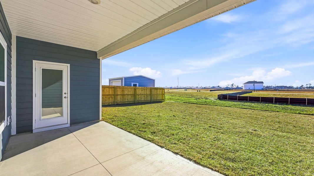 Exterior details and patio area of a home in Hodges Bayou Plantation, Panama City (Image 19).