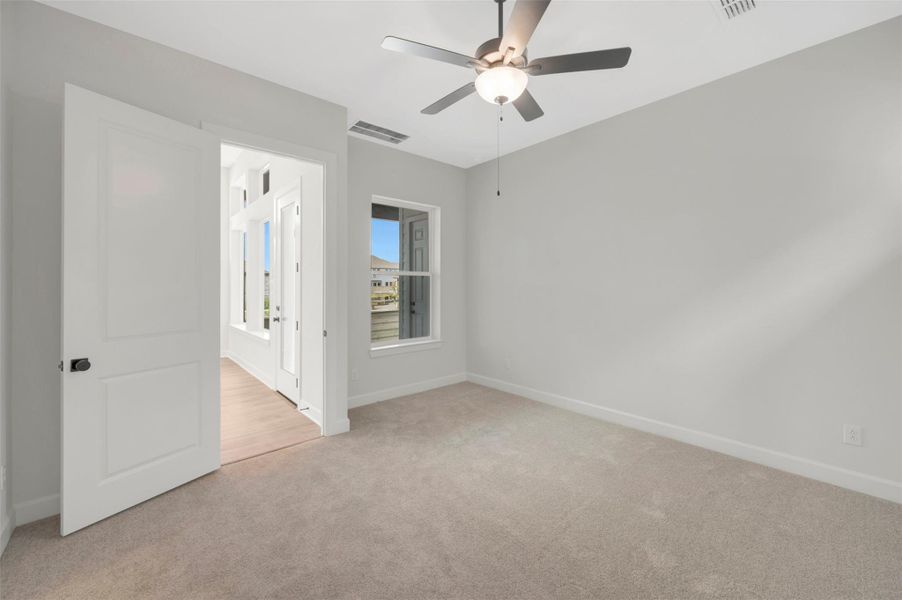 Spacious, unfurnished interior of a new home in Pomona - Grove Row Collection, Manvel (Image 21).