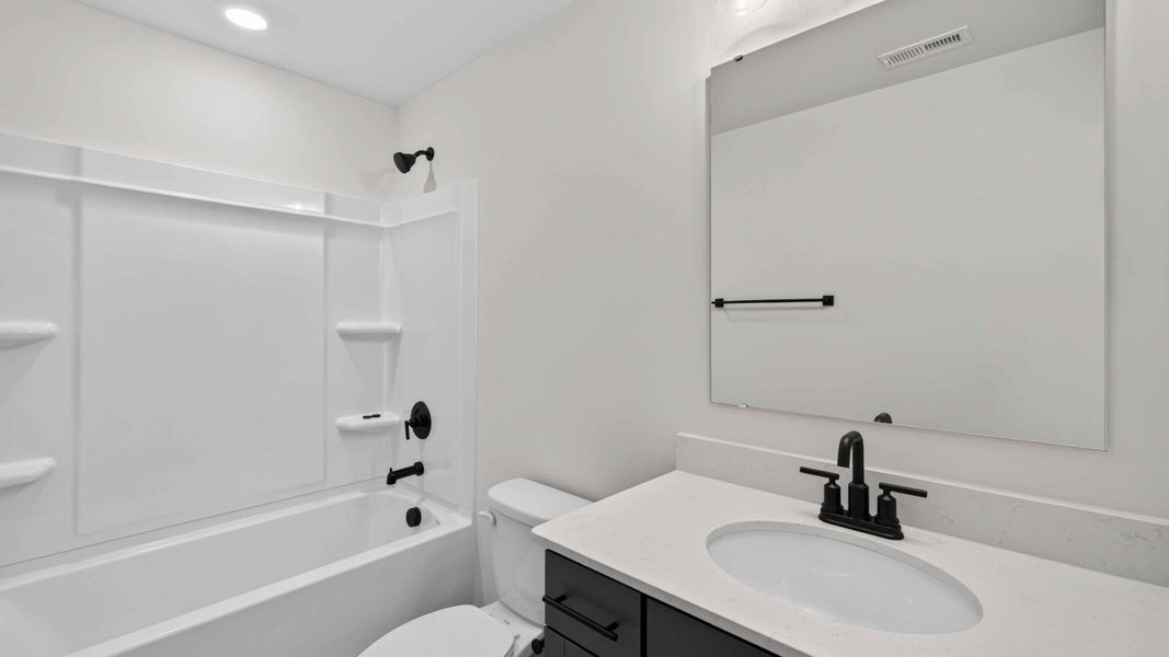 Furnished interior view inside a new home in Sylvan Creek, Denver (Image 24).