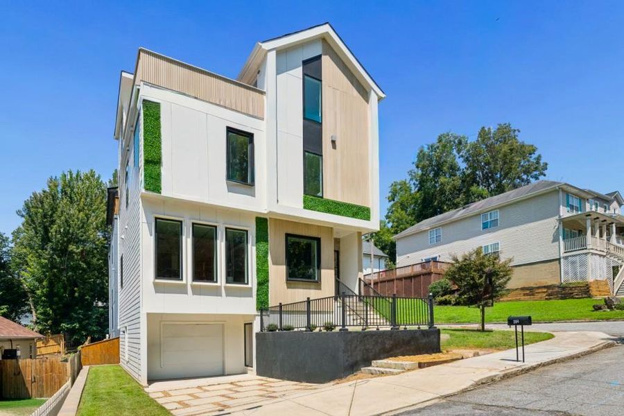 Front exterior of a new home in , Atlanta, GA, highlighting curb appeal (Image 2).