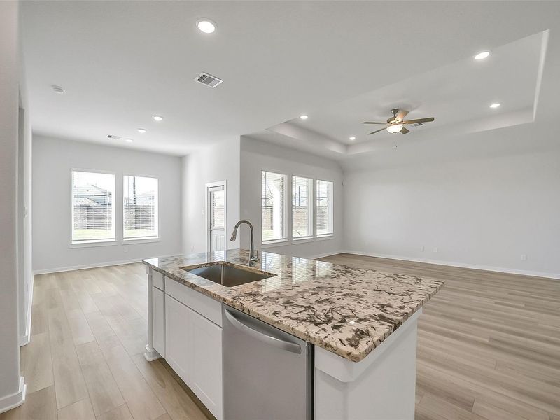 Furnished interior view inside a new home in Sunterra, Katy (Image 14).