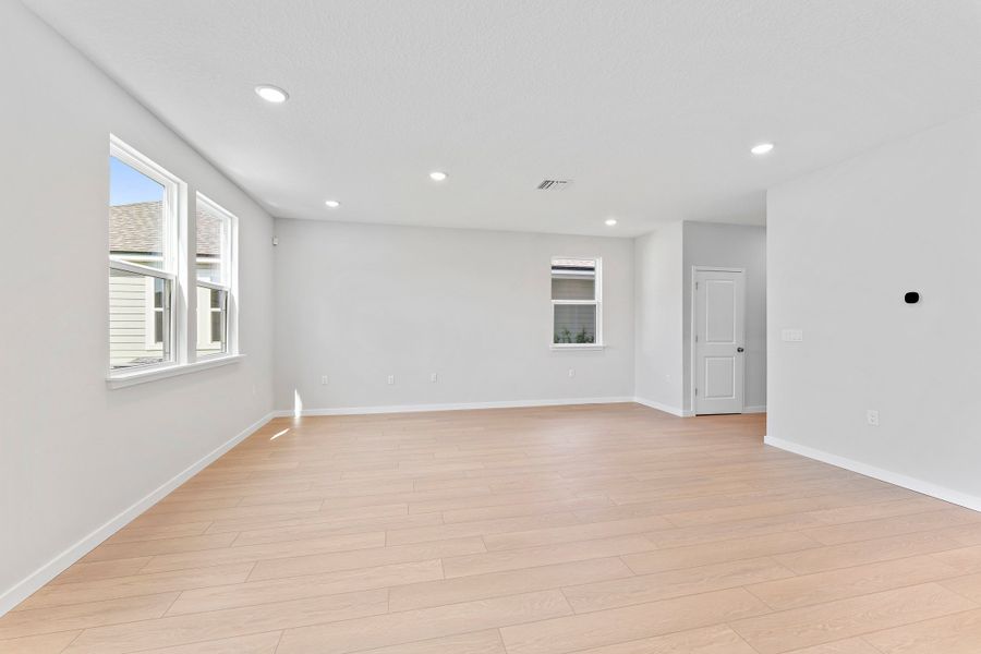 Lot 20 Ponderosa II Dining Area Overlooking Living Room at Camden Woods in Kingsland, GA