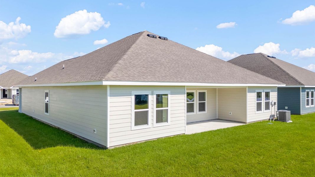Front exterior of a new home in Liberty, Panama City, FL, highlighting curb appeal (Image 19). Front exterior of a new home in Liberty, Panama City, FL, highlighting curb appeal (Image 19).
