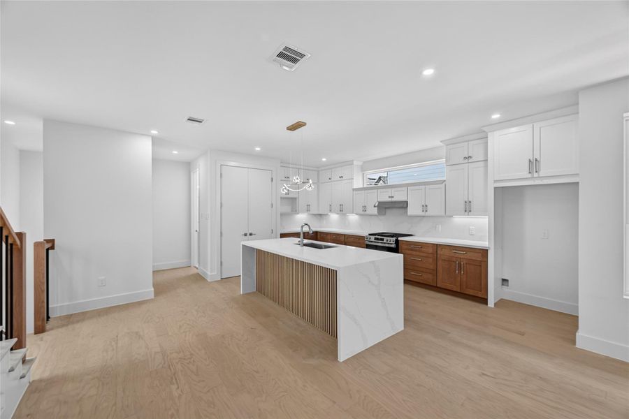 Another view of the spacious kitchen