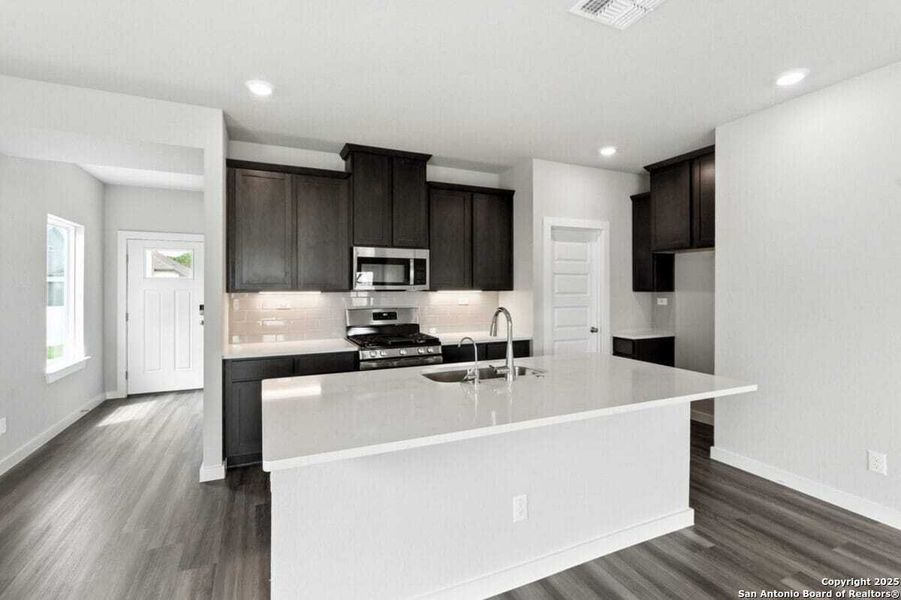 Furnished interior view inside a new home in August Fields, New Braunfels (Image 7).