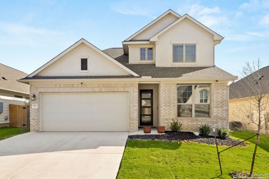 Front exterior of a new home in Overlook at Creekside, New Braunfels, TX, highlighting curb appeal (Image 20).