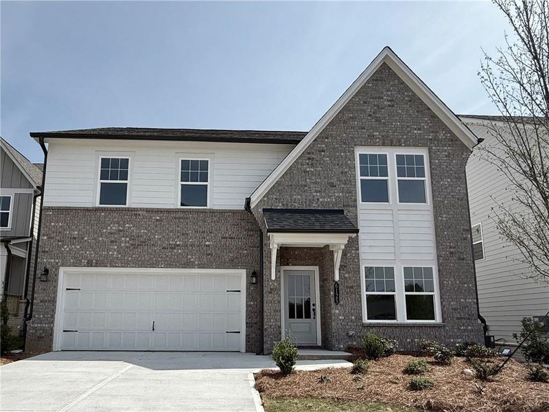 Front exterior of a new home in Arbors at Richland Creek, Buford, GA, highlighting curb appeal (Image 17).