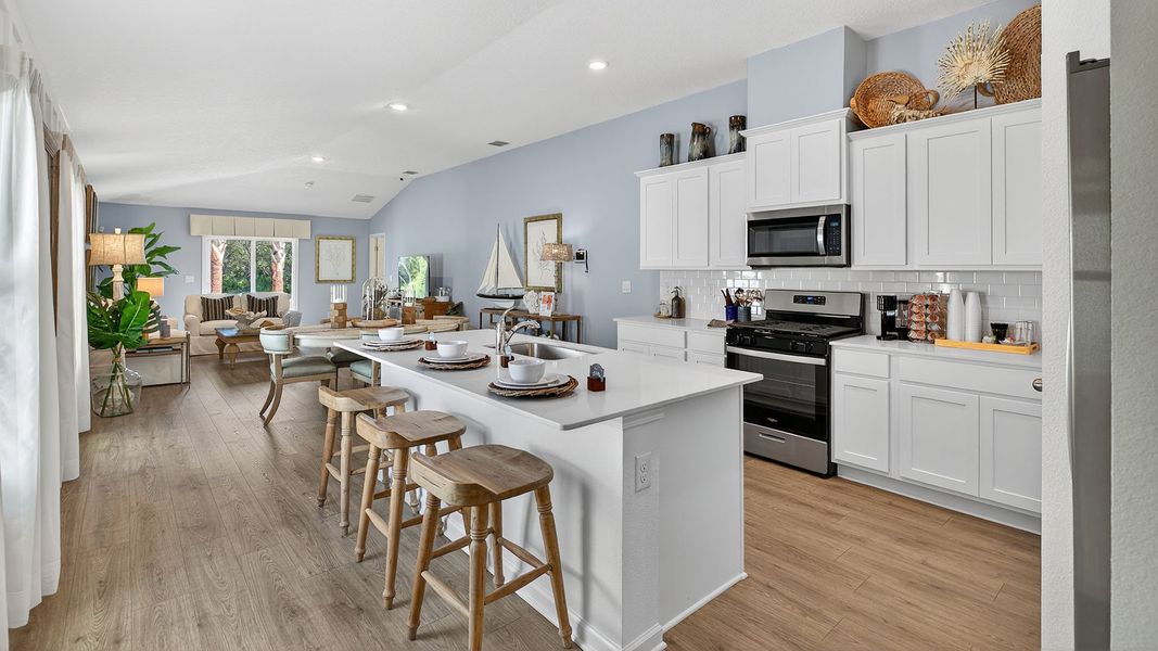 Representative furnished interior of a home built from the Berkeley II by D.R. Horton in Copes Landing, Jacksonville (Image 7).