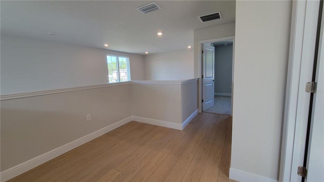 Spacious, unfurnished interior of a new home in , New Smyrna Beach (Image 12).