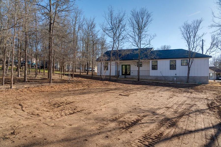 Exterior details and patio area of a home in , Bastrop (Image 24).