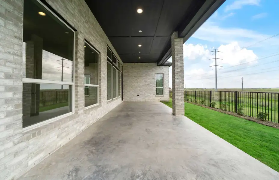 Exterior details and patio area of a home in Bridgeland 60′, Cypress (Image 4).