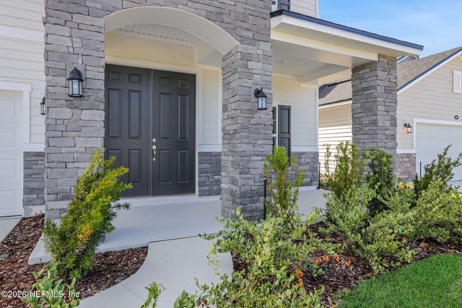 Exterior details and patio area of a home in Amberly, Green Cove Springs (Image 29).