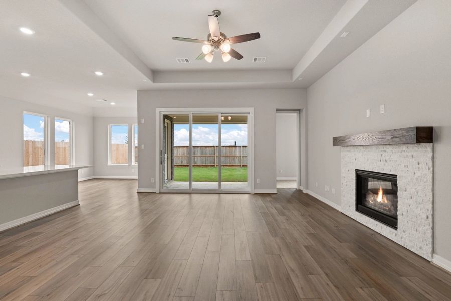 Gathering room. Sample product photo. Actual exterior and interior selections may vary by homesite. Photo may be virtually staged.