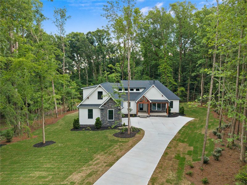 A private driveway leads to this newly built home A private driveway leads to this newly built home