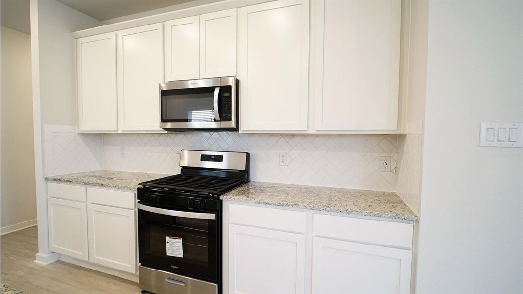 Furnished interior view inside a new home in Lonestar Collection at Aurora, Katy (Image 6).