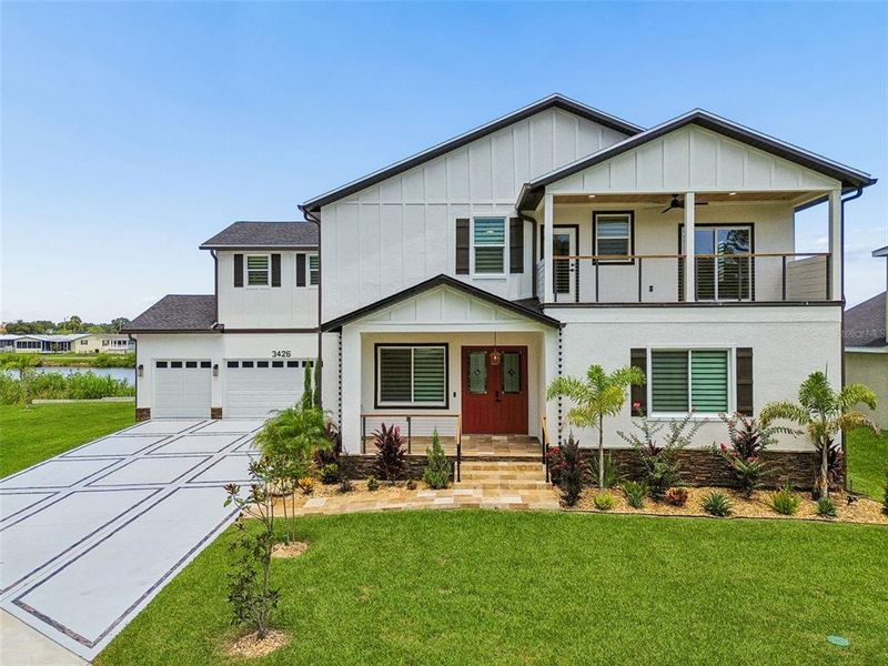 Front exterior of a new home in , Safety Harbor, FL, highlighting curb appeal (Image 34). Front exterior of a new home in , Safety Harbor, FL, highlighting curb appeal (Image 34).