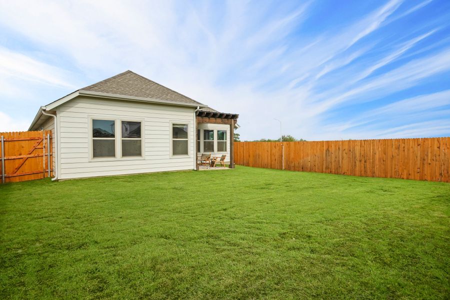 Patio in the Diamond home plan by Trophy Signature Homes – REPRESENTATIVE PHOTO