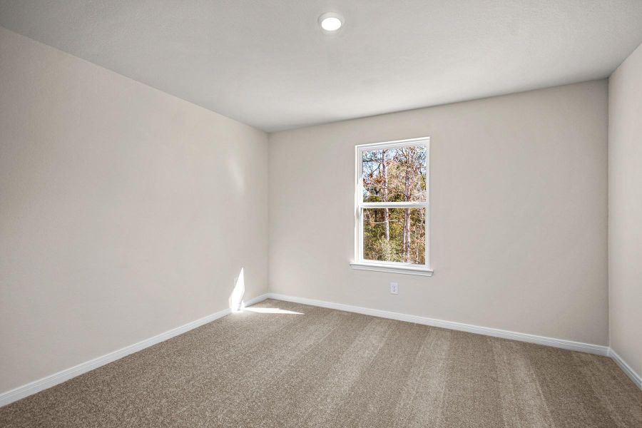Spacious, unfurnished interior of a new home in Trails at Cochran Ranch, Waller (Image 18).