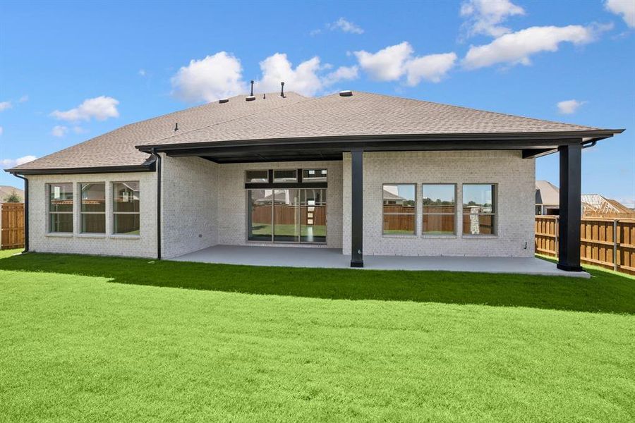 Front exterior of a new home in Terraces – Estates, Rockwall, TX, highlighting curb appeal (Image 2).